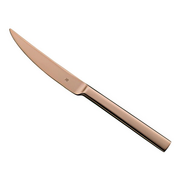 A WMF Unic Copper stainless steel steak knife.