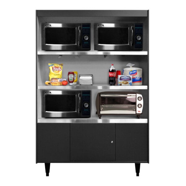 A black All State Manufacturing condiment stand with triple shelves holding microwaves and other appliances.