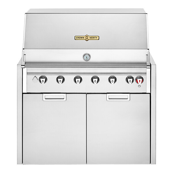 A stainless steel Crown Verity outdoor grill with knobs and drawers.