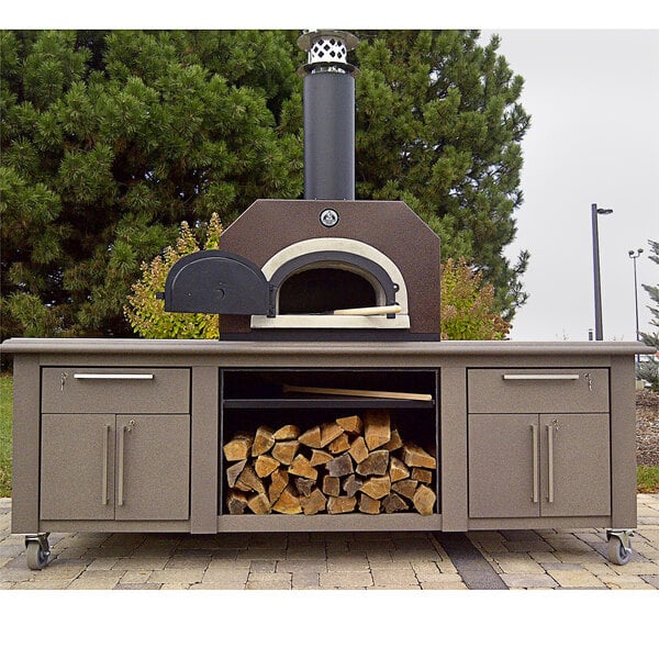 A Chicago Brick Oven wood-fired countertop pizza oven on a patio.