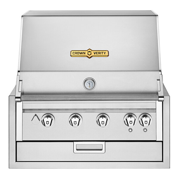 A silver Crown Verity built-in gas grill with knobs and buttons.
