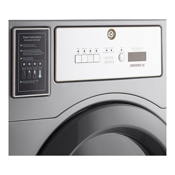 A close up of a white Crossover commercial dryer.