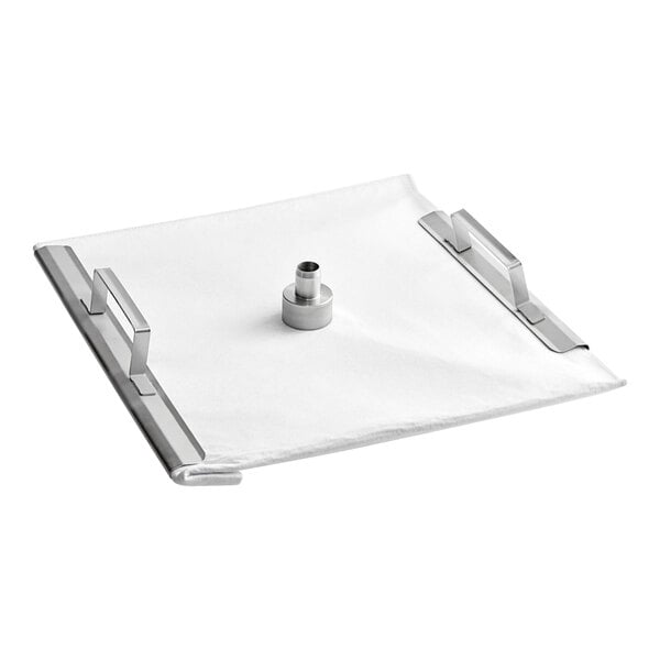 A white square cloth with metal handles.