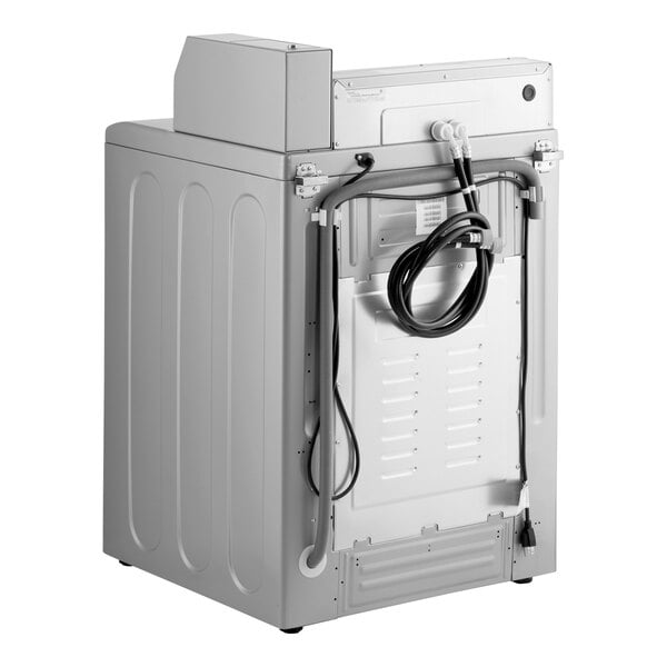 A white Encore top load commercial washer with a black cord.