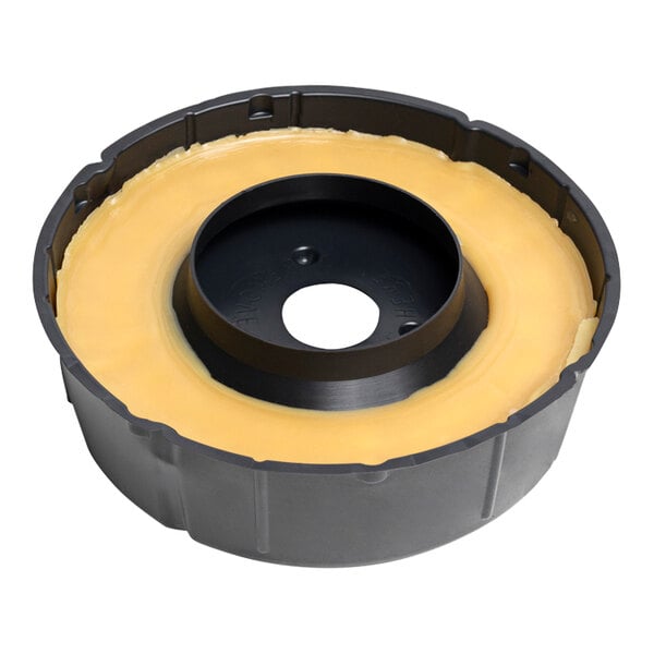A black circular container with a black wax ring inside.