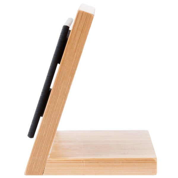 A wooden Cal-Mil framed write on board on a stand.