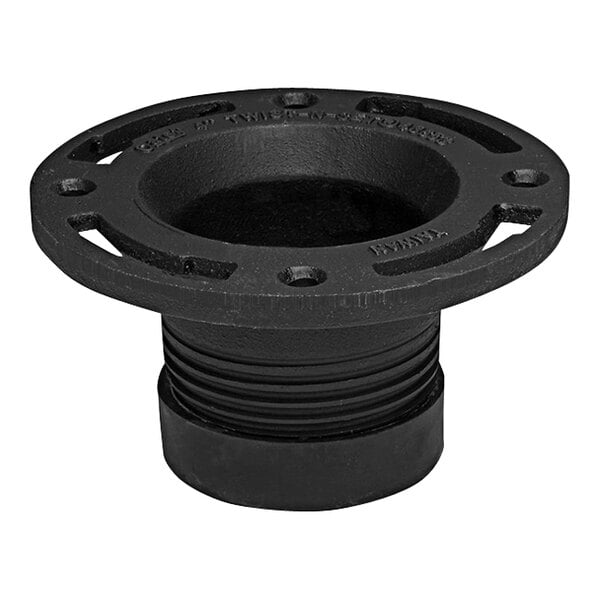 A black metal Oatey Twist-N-Set water closet flange with a hole in it.