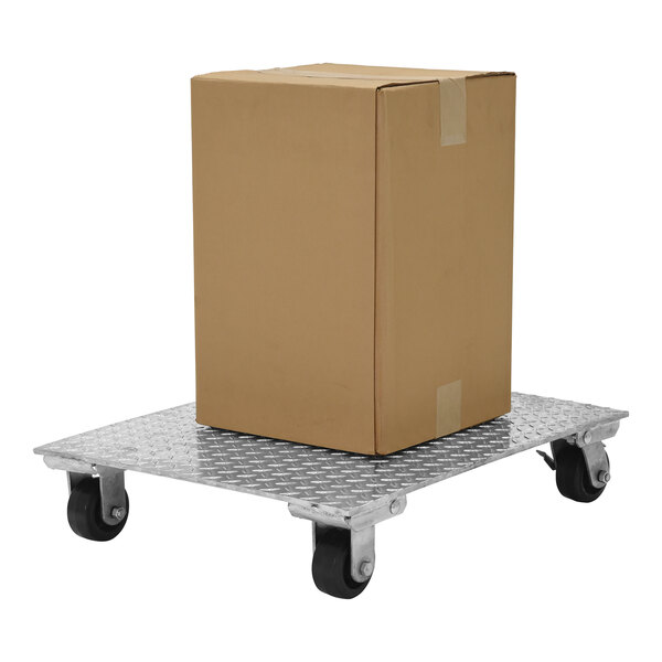 A cardboard box on a metal platform with wheels.