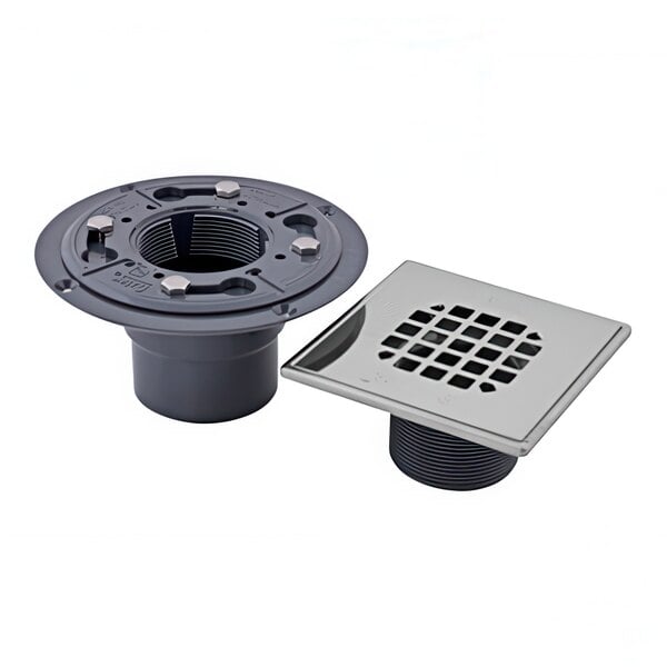 A grey Oatey PVC shower drain with a silver square stainless steel snap-in strainer.