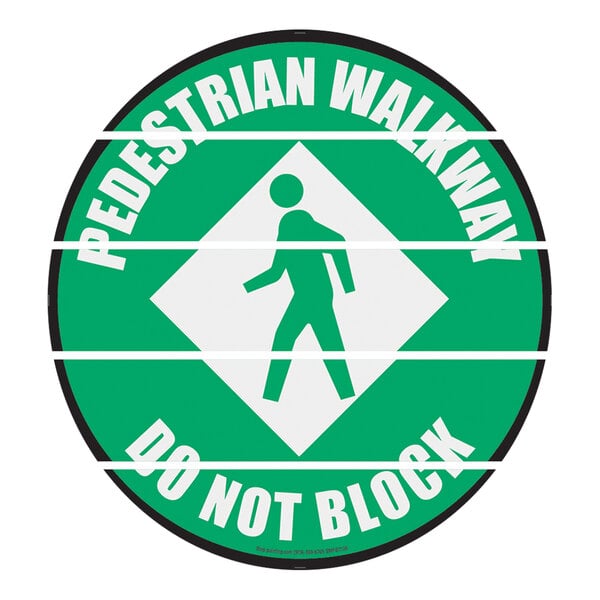 A green and white Superior Mark "Pedestrian Walkway" floor sign.