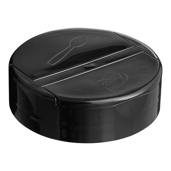 A black plastic dual flapper spice lid with 7 holes.