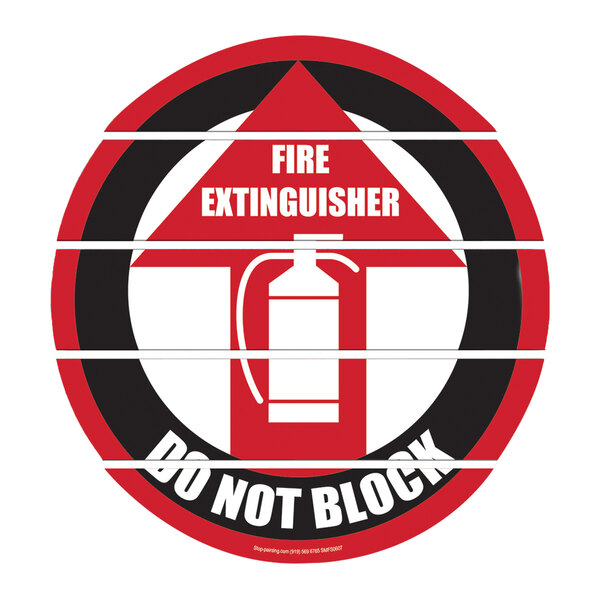 A red and black Superior Mark "Fire Extinguisher Do Not Block" floor sign.