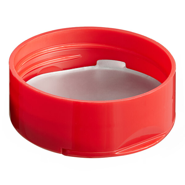 A red plastic 48/485 spice lid with a white heat induction liner with dual flappers.