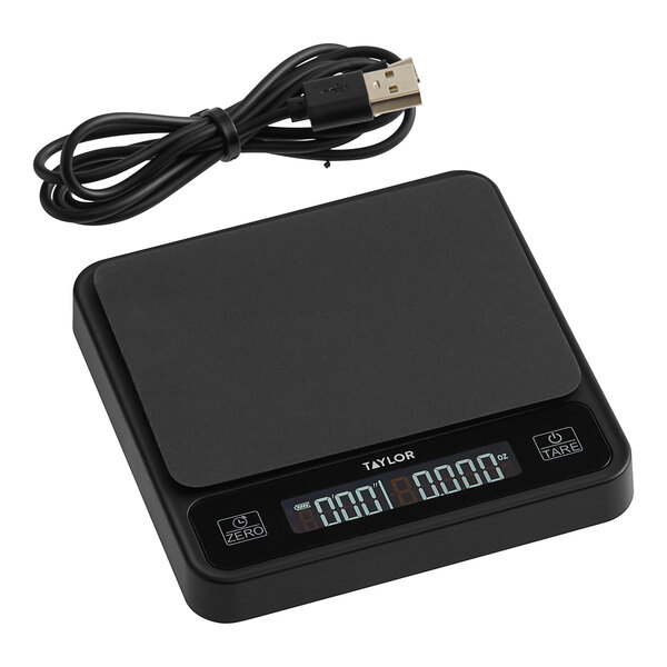 A black electronic Taylor coffee scale with a digital display and a cord.