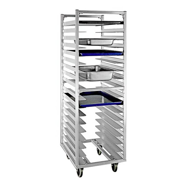 A New Age aluminum sheet pan rack with metal trays on it.