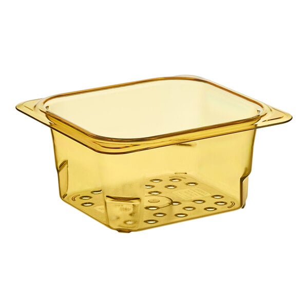 A yellow plastic square colander pan with holes in it.