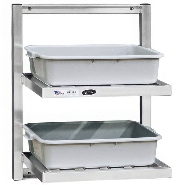 A metal wall shelf with aluminum trays on it.