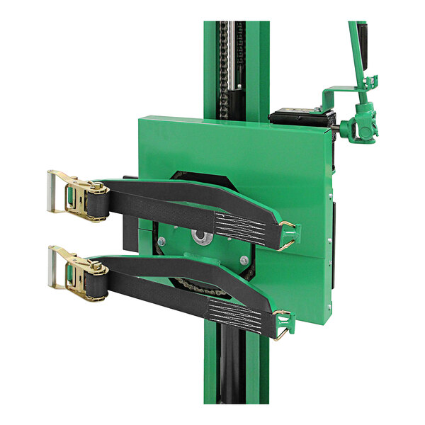 A green and black Valley Craft drum rotator attachment with black straps.