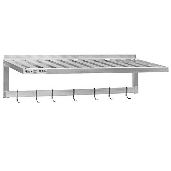 A metal wall shelf with a pot rack and hooks.