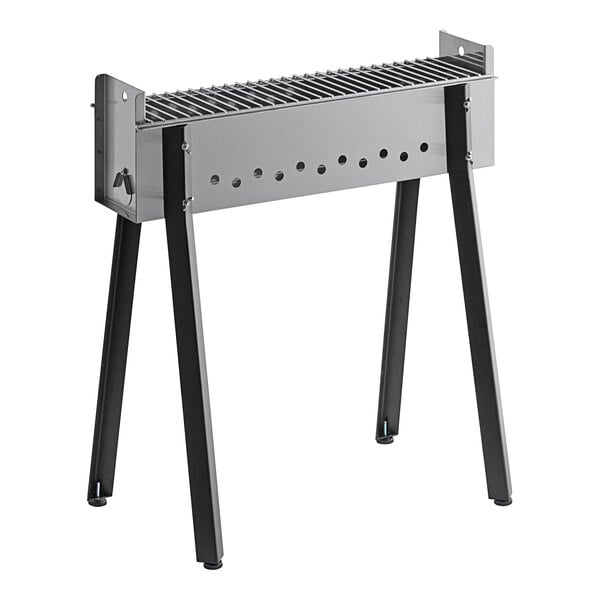 A Backyard Pro stainless steel charcoal kebab grill on legs.