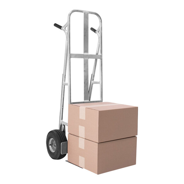 A Valley Craft hand truck with two boxes on it.