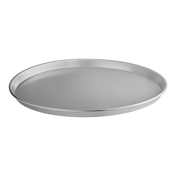A silver aluminum Choice deep dish pizza pan.
