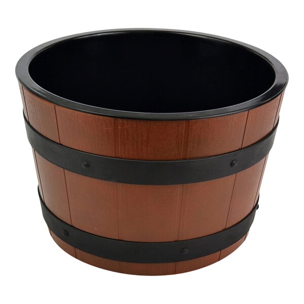 A brown and black ABS plastic barrel with a black rim and handles on a table.