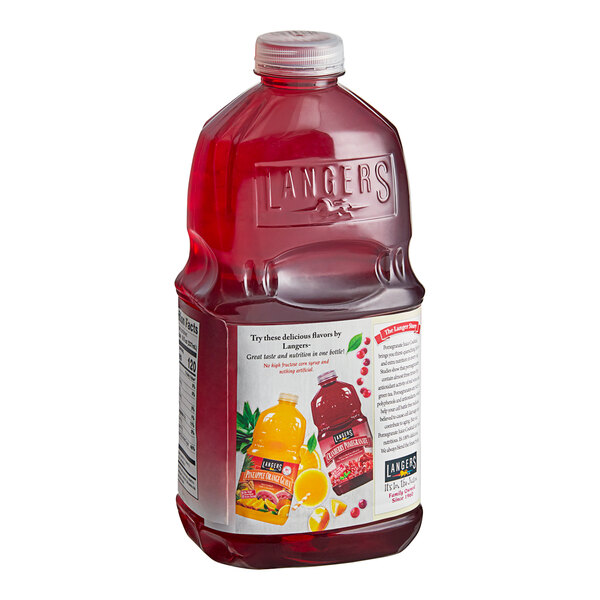 A Langers Pomegranate Juice bottle with a label.
