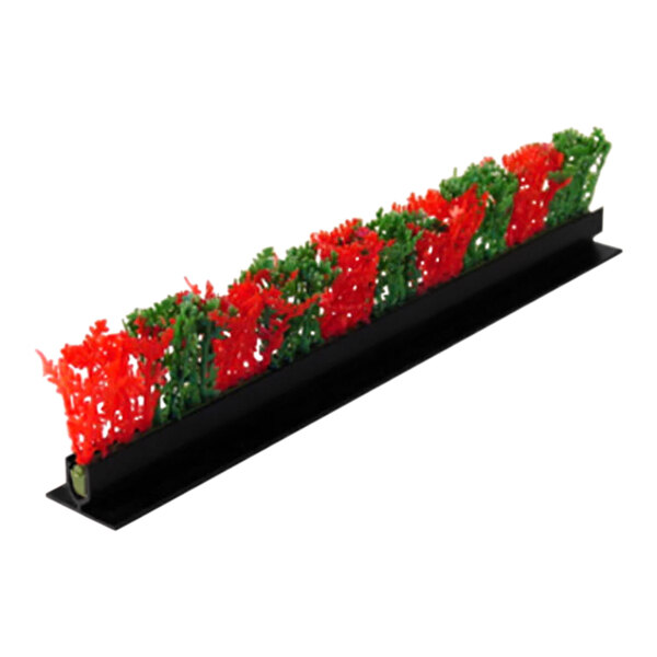 A long black rectangular Dalebrook display divider with red and green artificial plants.