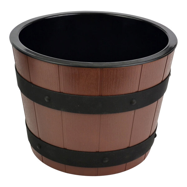 A Dalebrook wooden barrel display bowl with black trim.