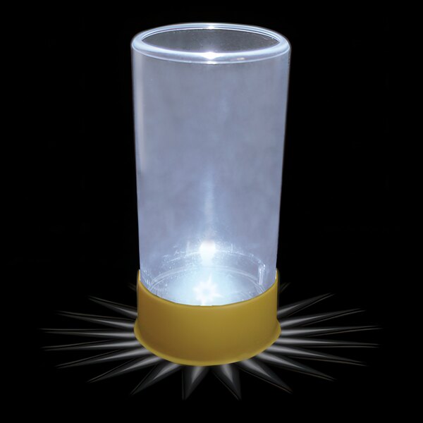 A clear plastic shotgun shell shot cup with a white LED light inside.