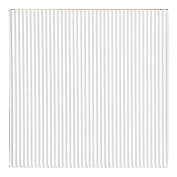 A white square Choice pizza pad with lines on it.