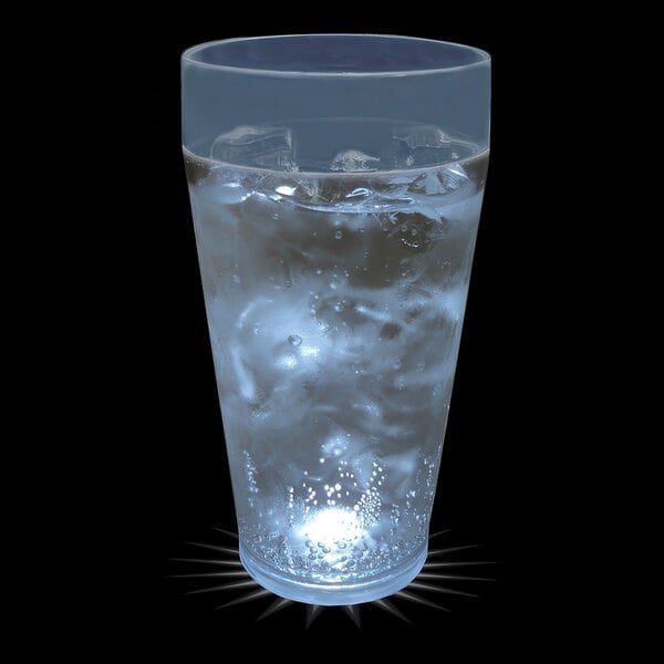 A customizable plastic cup filled with water and ice with a white LED light shining in it.