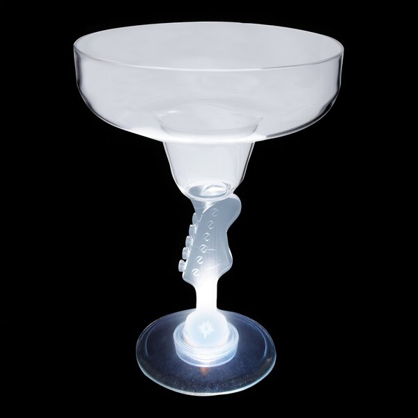 A clear plastic guitar margarita cup with a light on the bottom.