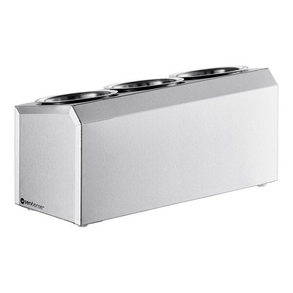 A stainless steel three compartment flatware organizer with perforated cylinders.