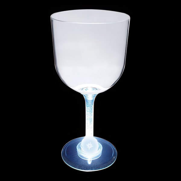 A clear plastic goblet with a white LED light on it.