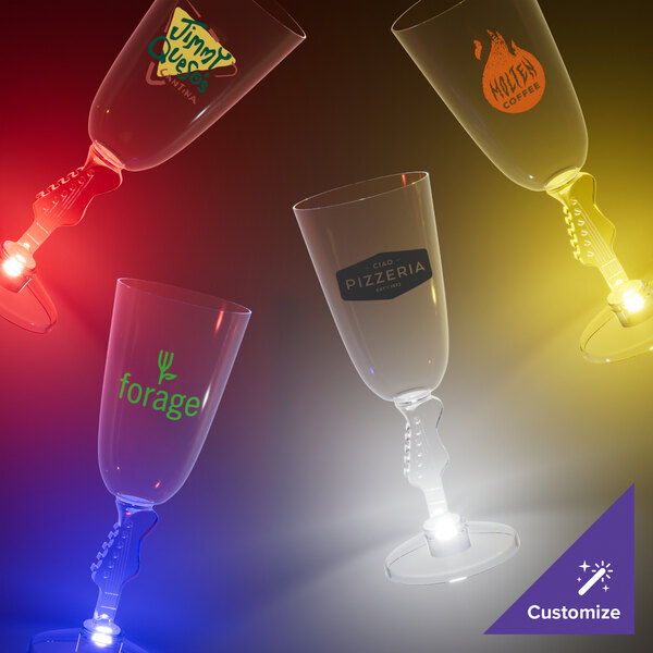 A clear plastic wine glass with a guitar-shaped stem and white LED light.
