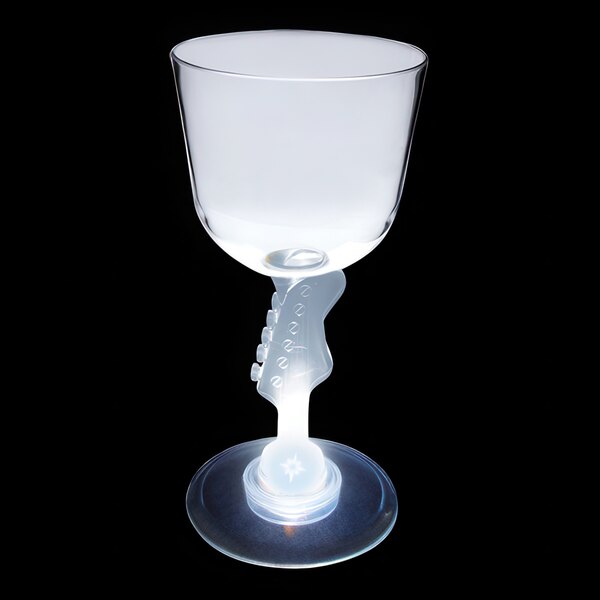 A clear plastic guitar stem wine cup with a white LED light inside it.