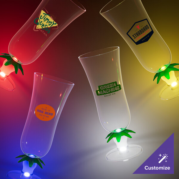 Three customizable plastic palm tree hurricane cups with white LED lights.