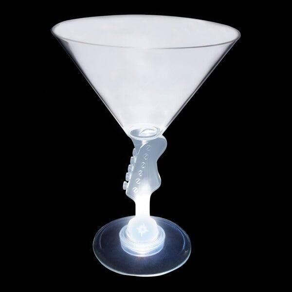 A clear plastic martini glass with a guitar stem lit up in white.