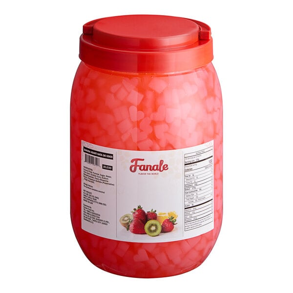 A plastic container of Fanale Sakura cherry blossom heart-shaped jelly with a red lid.