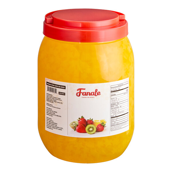 A jar of Fanale Mango Star-Shaped Jelly Topping with yellow liquid inside.
