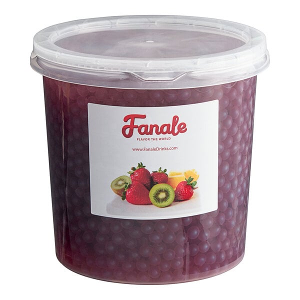 A plastic container of Fanale Raspberry Popping Boba with a label.
