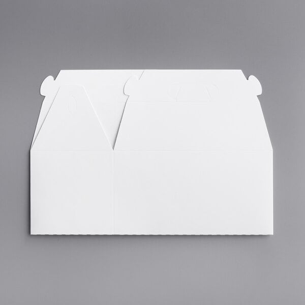 A white barn take-out lunch box with a cut-out top.