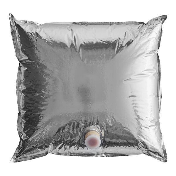 A silver square bag-in-box with a Red Gold Tomato Ketchup bottle inside.