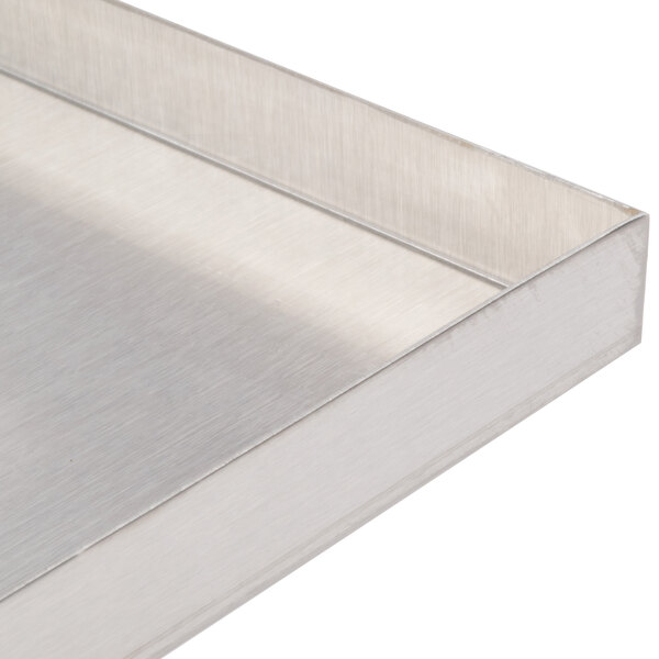 A close-up of a stainless steel Grindmaster-Cecilware fry tank cover.