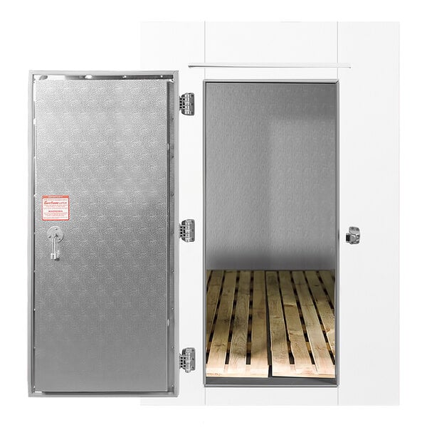 The open metal swing door of a Leer Auto Defrost Cooler / Freezer.