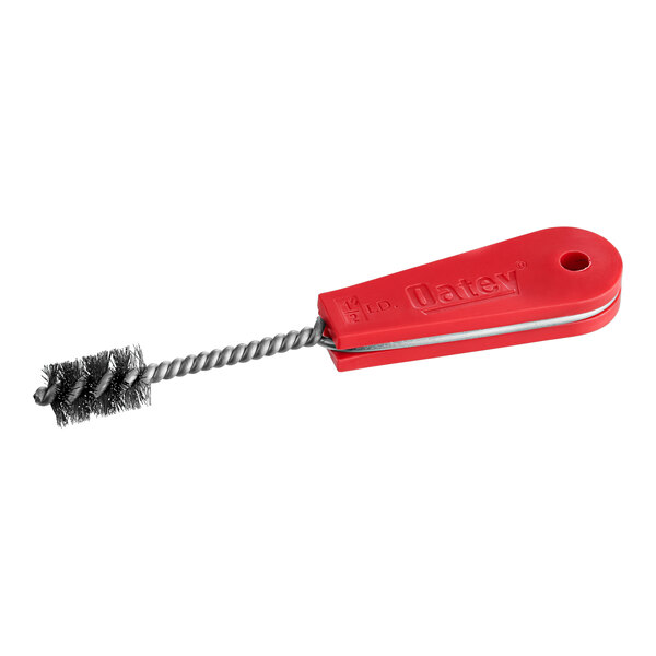 A red and silver Oatey 1/2" fitting brush with a metal handle.