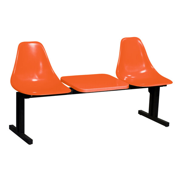 An orange Sol-O-Matic modular seating unit with a table.