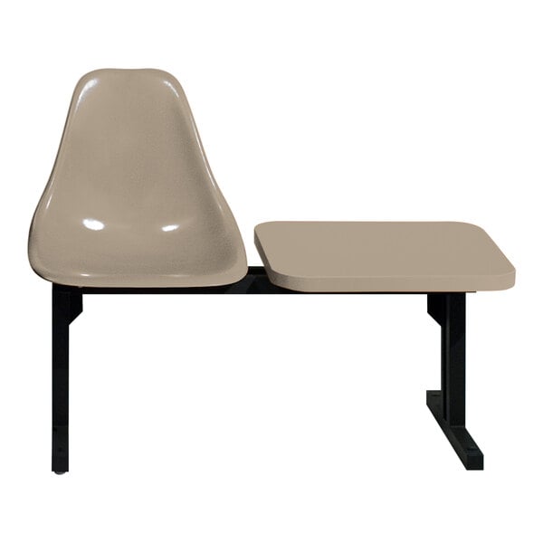 A Sol-O-Matic modular seating unit with a table attached, including a beige chair and a white table top.